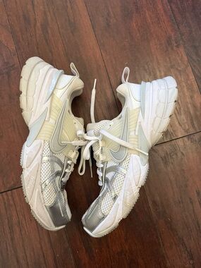 Nike Women’s White and Silver Sneakers